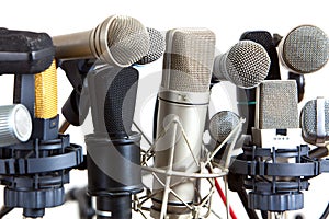 Several kind of conference meeting microphones on white