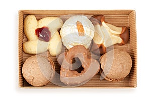 Several kinds of cookies and cakes in open box