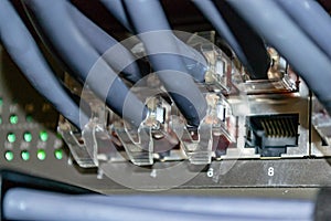 Several LAN cables connected to ethernet switch formed communication network