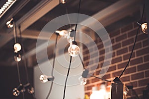 Several light bulbs suspended from the ceiling