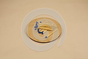 Several matches on a wooden board