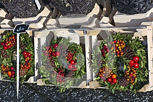 Several new years wreathes with cones