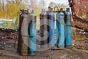 Several old gas cylinders.