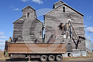 Several old rickety grain elevators