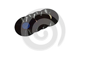 Several old vinyl records, on a white background