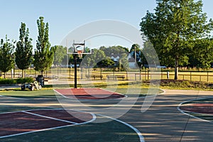 Several open basketball courts on a sunny morning