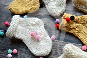 Several pairs of handmade woolen socks for newborn