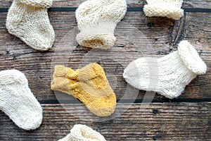 Several pairs of handmade woolen socks for newborn