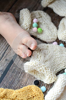 Several pairs of handmade woolen socks for newborn
