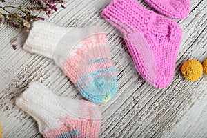 Several pairs of handmade woolen socks for newborn