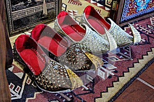 several pairs of souvenir shoes made in the style of ancient Azerbaijani fashions photo