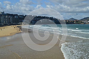 Several People Practicing Kayak On The Beach Of La Concha In San Sebastian. Sport Travel Nature.