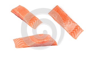 Several pieces of red fish isolated on a white background