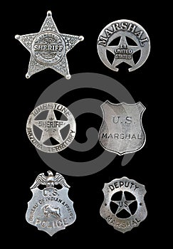 Several Police and Sheriff Badges