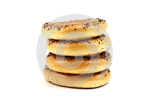 Several poppy bagels stacked