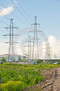 Several power towers on summer day