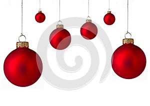 Several red Christmas baubles photo