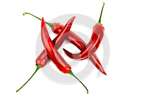 Several red hot peppers on a white background