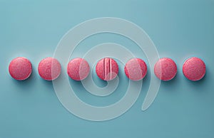 Group of Red Pills on Blue Surface