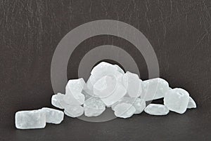 Several rock candy on dark background
