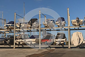 Several sailing boats resting on the shore