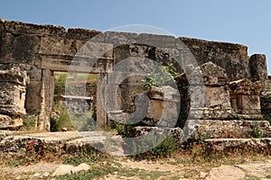 Several sarcophagus sarcophagi placed in front of a mausoleum at the northern Necropolis of the ancient site of Hierapolis,