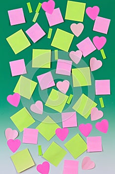 Several sheets of paper on green