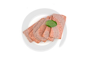 Several slices of breakfast meat