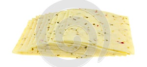 Several slices of pepper jack cheese side view