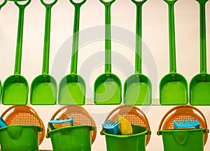 Several spades and buckets for playing children