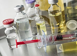 Several syringes and vials in a laboratory in a hospital