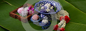 Several Thai traditional dessert serving on porcelain and wooden tray