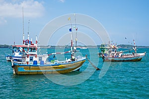 Several traditional local boats to catch fish in Weligama Bay.