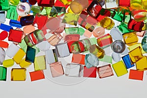 variety transparent colored plastic resin granulates for background photo