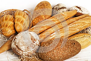 Several types of bread on white background