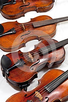 Several used fiddles photo
