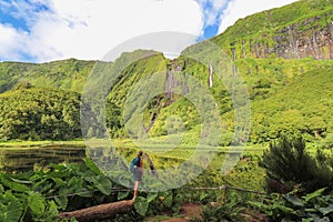 Several waterfalls that spring from the mountain and feed the lagoon, Poco da Alagoinh, Flores, Azores