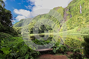 Several waterfalls that spring from the mountain and feed the lagoon, Poco da Alagoinh, Flores, Azores