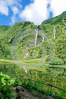Several waterfalls that spring from the mountain and feed the lagoon, Poco da Alagoinh, Flores, Azores