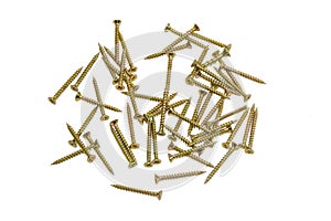 Several wood screws with countersunk head on light background