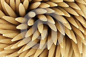 Several wooden toothpicks background