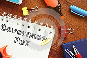 Severance Pay is shown on the conceptual business photo