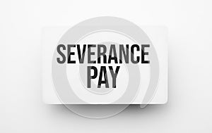 severance pay sign on notepad on the white backgound