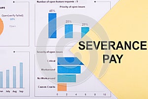 SEVERANCE PAY text on the yellow card on the chart background