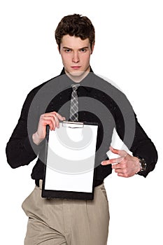 Severe businessman holding blank clipboard