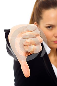 Severe businesswoman with thumb down