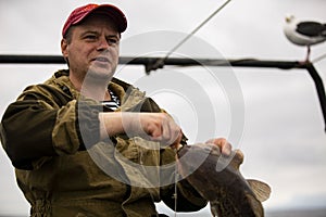 The severe fisherman of the Sea of Okhotsk.