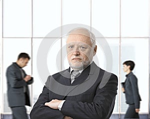 Severe senior businessman