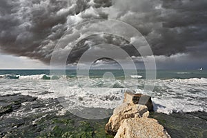 Severe storm cloud over the surf