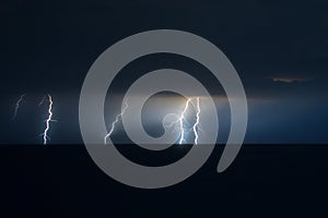 Severeal lightning strikes next to each other over the Adriatic Sea